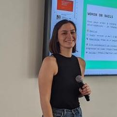 Camille Regnault speaking at a conference
